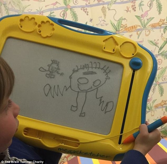 3f9874e400000578-4444530-becoming_frustrated_at_his_own_pain_the_infant_then_used_his_toy-m-53_1493137403201